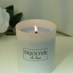 Vela perfumada dejolyer encendida